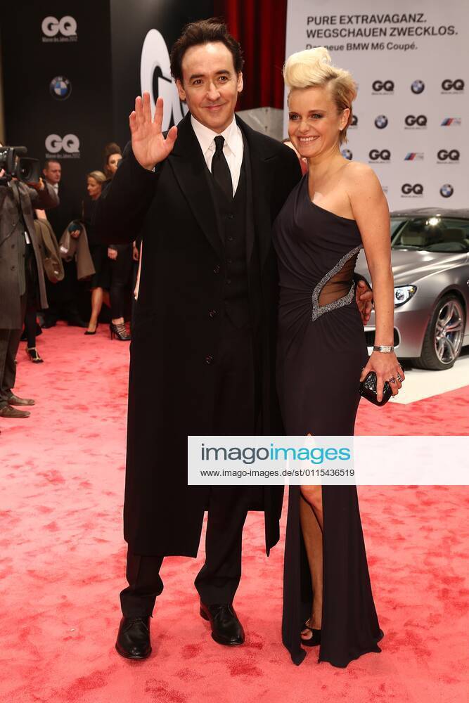 John Cusack and Barbara Sturm at the GQ Men of the Year 2012 award ceremony in Berlin Mens style magazine GQ Gentlemens Quarterly from Conde Nast Verlag presents the award at the Komische Oper in Berlin.