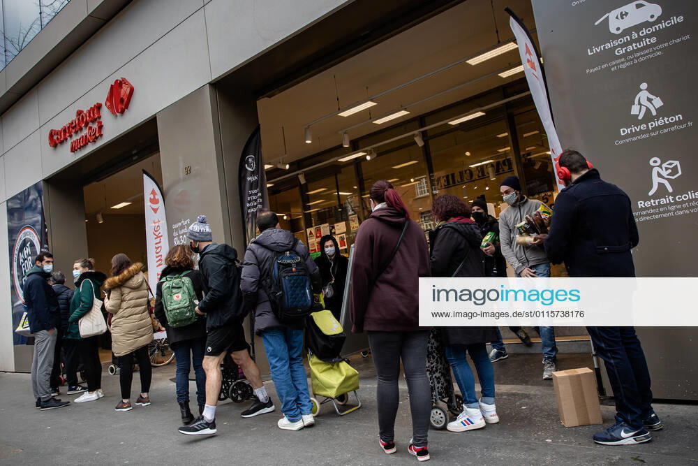 (210320) -- PARIS, March 20, 2021 -- People line up to enter a supermarket in Paris, France, on March 20, 2021. French Prime Minister Jean Castex on Thursday announced new massive measures to curb COVID-19 in the country s 16 worst-hit regions, including Paris. Starting Friday midnight, about 18 million French people in regions such as Paris, Hauts-de-France in the north as well as the Alpes-Maritimes on the Mediterranean should stay at home, Castex announced at a press briefing on the epidemic situation. (Photo by Xinhua) FRANCE-PARIS-COVID-19-PARTIAL LOCKDOWN AurelienxMorissard