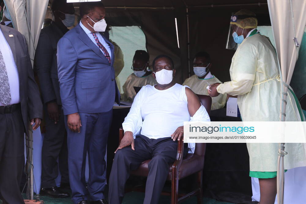 (210324) -- VICTORIA FALLS (ZIMBABWE), March 24, 2021 -- Zimbabwean President Emmerson Mnangagwa (C) prepares to receive the COVID-19 vaccine in Victoria Falls, Zimbabwe, on March 24, 2021. Mnangagwa got his first shot of China s Sinovac COVID-19 vaccine in Victoria Falls on Wednesday. (Photo by Xinhua) ZIMBABWE-VICTORIA FALLS-PRESIDENT-COVID-19 VACCINE ChenxYaqin