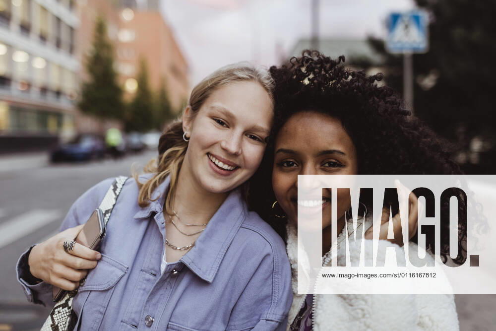 Portrait of smiling friends in city Sweden,Stockholm, model released