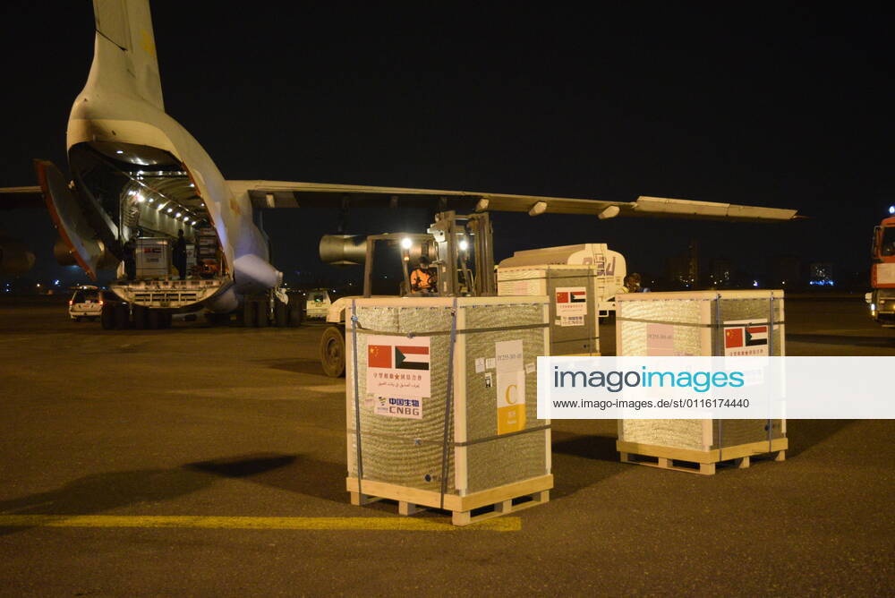 (210327) -- KHARTOUM, March 27, 2021 -- Chinese vaccines are unloaded from a plane at the Khartoum International Airport in Khartoum, Sudan, March 26, 2021. A batch of China s Sinopharm COVID-19 vaccines, donated by the Chinese government to Sudan, arrived here on Friday. ) SUDAN-KHARTOUM-CHINESE VACCINE-ARRIVAL MaxYichong
