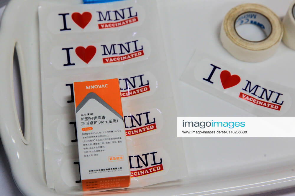 (210331) -- MANILA, March 31, 2021 -- A box of Sinovac vaccine is seen on stickers to be used as signs after vaccination at a vaccination site in Manila, the Philippines on March 31, 2021. The Philippines Department of Health (DOH) reported on Wednesday 6,128 new COVID-19 infections, bringing the total number of confirmed cases in the Southeast Asian country to 747,288. ) PHILIPPINES-MANILA-COVID-19-SINOVAC VACCINES RouellexUmali