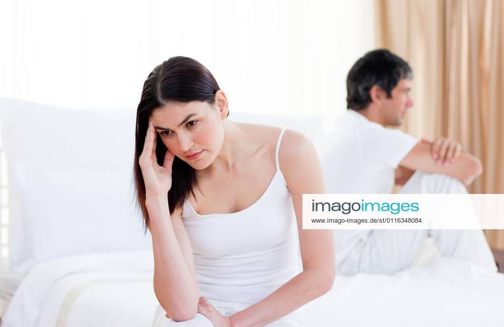 Angry couple having an argument sitting on bed Angry couple having an argument sitting on bed at home, model released, Cape Town, South Africa, 17.10.2009, 38589.jpg, bed, wife, home, glum, riled, vexed, irate, morbid, gloomy, dismal, ireful, lovers, bitter, couple, divorce, married, unhappy, annoyed, husband, bedroom, indoors, offended, troubled, mournful, argument, bereaved, affronted, depressed, boyfriend, irascible, irritable, resentful, interiors, despairing, despondent, melancholy, distressed, infuriated, girlfriend, displeased, exasperated, exacerbated, pessimistic, relationship, lowspirited, heterosexual, disconsolate 30s, Mid Adult, Man, Male, Caucasian, 20s, Young Adult, Woman, Female, Caucasian Appearance, 35-39 Years, Mid Adul