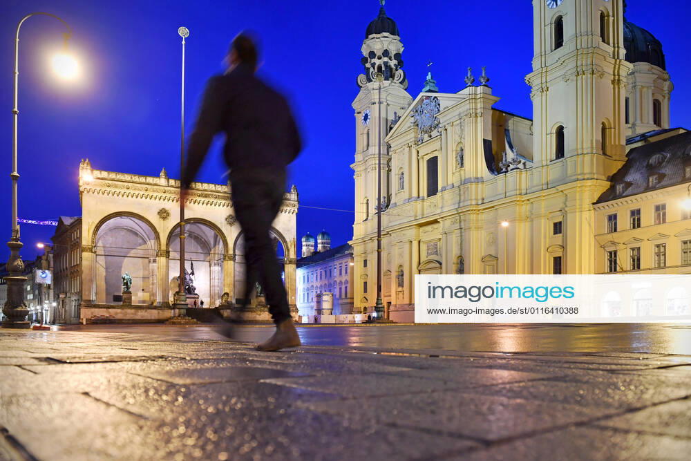 Theme image Is the bridge lockdown coming to break the third wave Nearly deserted Odeonsplatz in Munich with Feldherrnhalle and Theatiner church on 06 04 2021 Night curfew,curfew,night shot,
