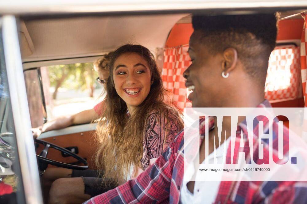 Smiling friends in camper van Smiling friends traveling in camper van, model released, , property released, Cape Town, South Africa, 09.03.2017, 977431.jpg, smiling, friend, traveling, camper van, sitting, travel, transportation, mode of transportation, land vehicle, togetherness, bonding, friendship, casual, lifestyle, leisure, window, steering wheel, sunlight, enjoyment, fun, happiness, toothy smile, millennial Outdoors,Front view,Side view,Day
