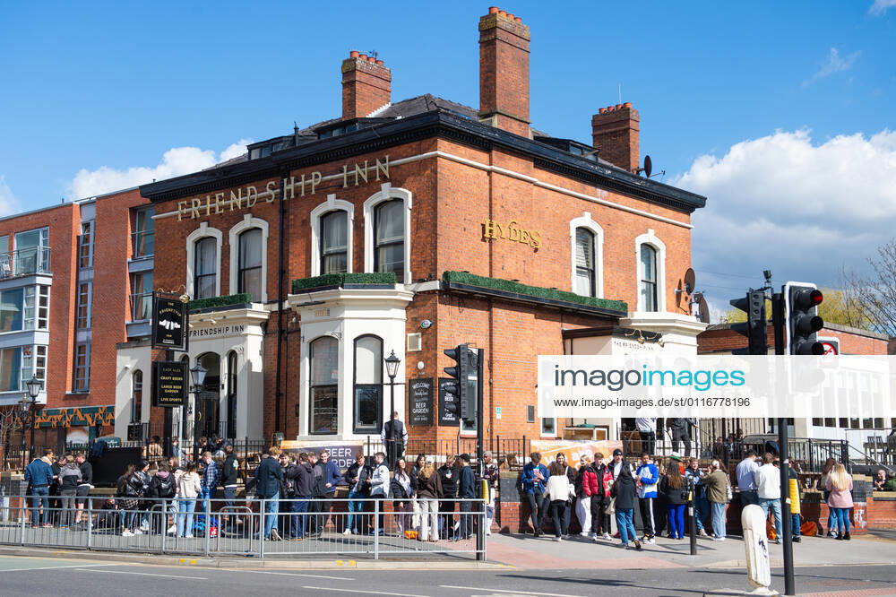 A large queue outside the Friendship Inn as people wait to drink in the beer garden of the pub, in the predominantly student area of Fallowfield, south Manchester on 12 April 2021. Customers have returned to the High Street on Monday as non-essential retailers in England and Wales reopened after more than three months of lockdown restrictions due to the Covid-19 pandemic. Manchester Greater Manchester England City centre