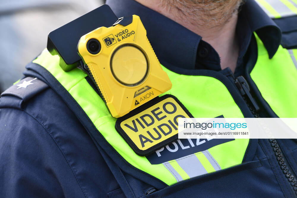 Theme image Bodycam at the police A device for video and audio recording on the uniform of a police officer at shoulder height,