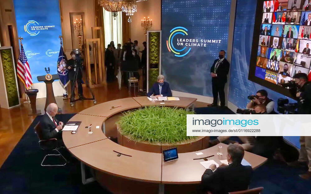 KW16 Online climate summit U.S. President Joe Biden (L) attends a virtual climate summit amid the coronavirus pandemic on April 22, 2021, as seen in this screenshot image.