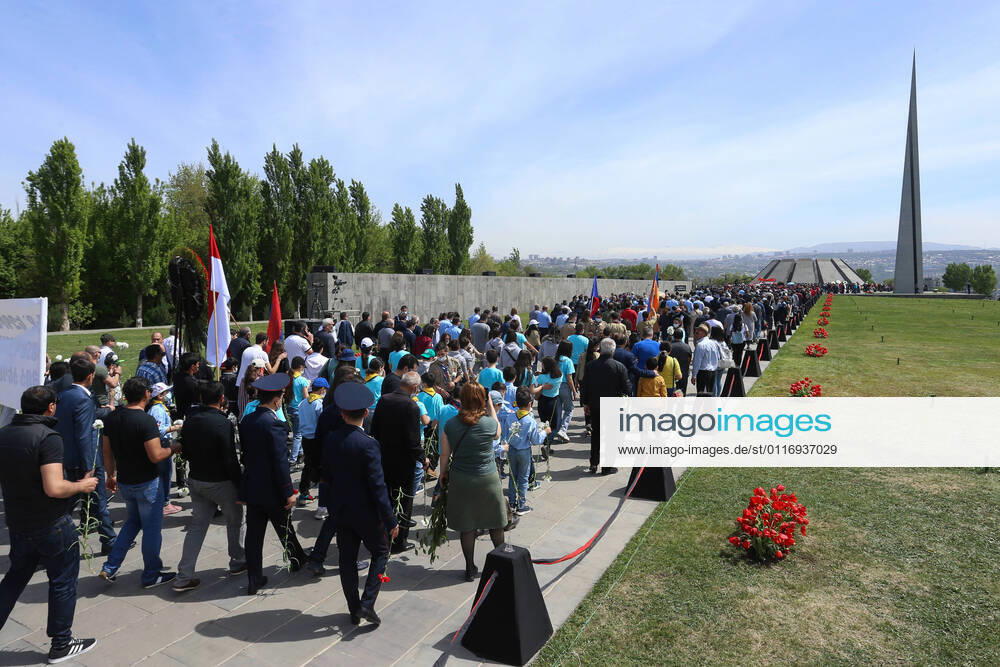 KW16 YEREVAN, ARMENIA â€“ APRIL 24, 2021: People attend a flower laying ceremony at the Armenian Genocide Memorial Complex on Tsitsernakaberd Hill on Armenian Genocide Remembrance Day, which commemorates the victims of the Armenian Genocide in the Ottoman Empire. Hayk Baghdasaryan Photolure TASS TS0FDE7C