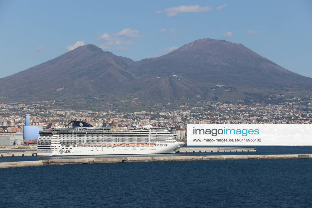 Theme photo vacation, travel, cruise, Corona, 24 04 2021 The MSC Preziosa in the port of Naples with theVesuvius in the background, theme photo vacation, travel, cruise, Corona