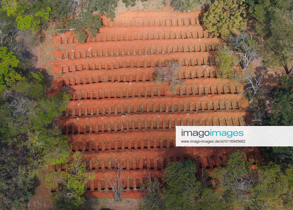 Brazil: View of the open graves at the Vila Formosa Cemetery (EDITORS NOTE: Image taken by a drone) Aerial images of the open graves at the Vila Formosa Cemetery in São Paulo. The country has recorded 2,866 deaths from Covid-19 in the past 24 hours and has totaled 386,623 deaths since the start of the pandemic. With that, the moving average of deaths in the last 7 days reached 2,514. Sao Paulo Brazil