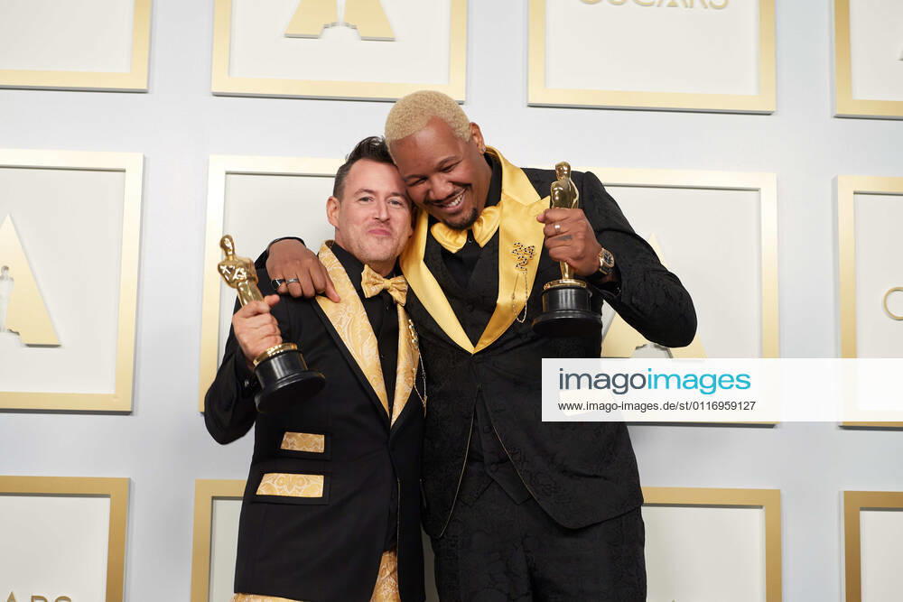 Martin Desmond Roe and Travon Free pose backstage with the Oscar for Live Action Short during the live ABC Telecast of The 93rd Oscars at Union Station in Los Angeles. Los Angeles USA - ZUMAz03_ 20210425_sso_z03_223