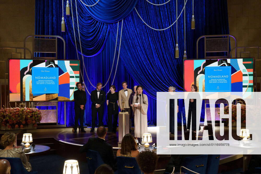 Chloe Zhao accepts the Oscars for Best Picture with during the live ABC Telecast of The 93rd Oscars at Union Station in Los Angeles, CA on Sunday, April 25, 2021. Los Angeles CA USA