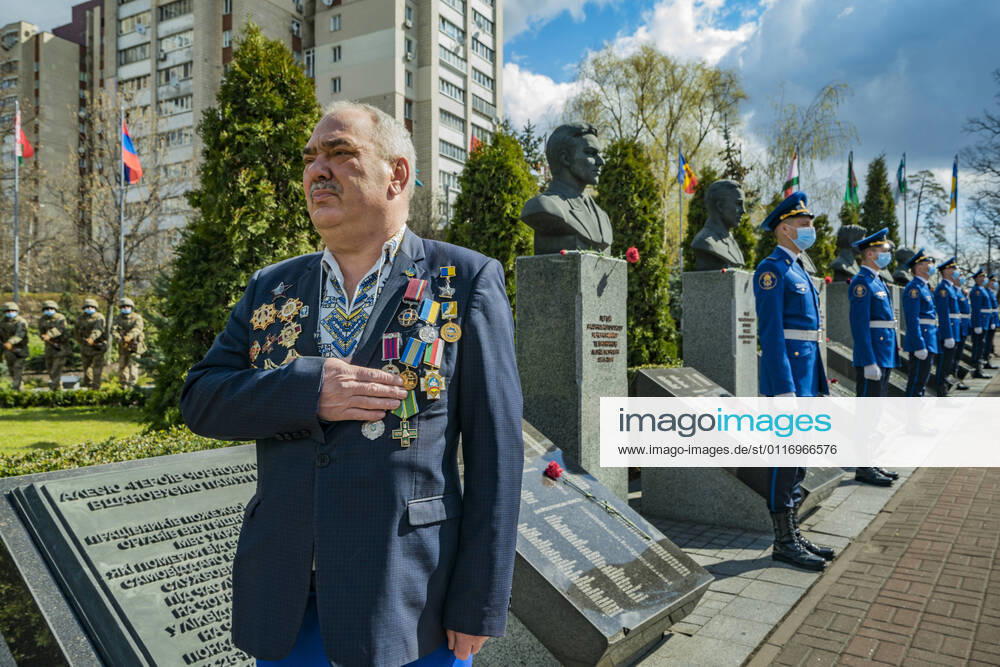 A Chernobyl liquidator shows his respects in the memorial site about the Chernobyl catastrophe during the celebrations in Kiev of the 35th anniversary of the Chernobyl nuclear accident, Ukraine. Liquidators were workers called upon to deal with consequences of the 1986 Chernobyl nuclear disaster. Kiev Ukraine - ZUMAa131 20210426_zap_a131_010