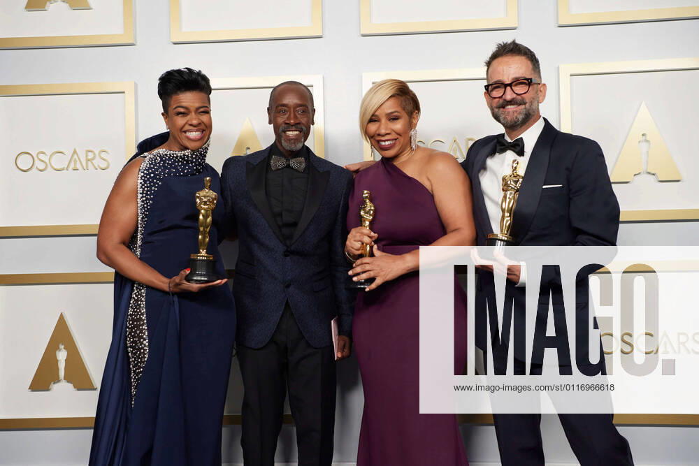 Mia Neal, Don Cheadle, Jamika Wilson, and Sergio Lopez-Rivera pose backstage with the Oscars for Makeup and Hairstyling during the live ABC Telecast of The 93rd Oscars at Union Station in Los Angeles, CA on Sunday, April 25, 2021. Los Angeles CA USA