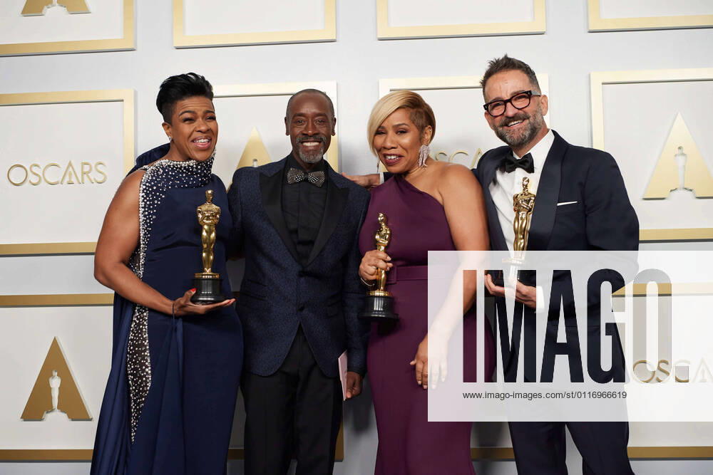 Mia Neal, Don Cheadle, Jamika Wilson, and Sergio Lopez-Rivera pose backstage with the Oscars for Makeup and Hairstyling during the live ABC Telecast of The 93rd Oscars at Union Station in Los Angeles, CA on Sunday, April 25, 2021. Los Angeles CA USA