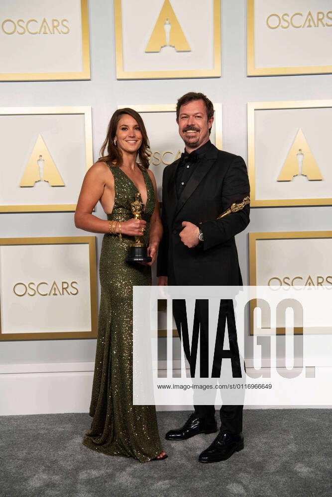 Pippa Erlich and James Reed pose backstage with the Oscars for Documentary Feature during the live ABC Telecast of The 93rd Oscars at Union Station in Los Angeles, CA on Sunday, April 25, 2021. Los Angeles CA USA