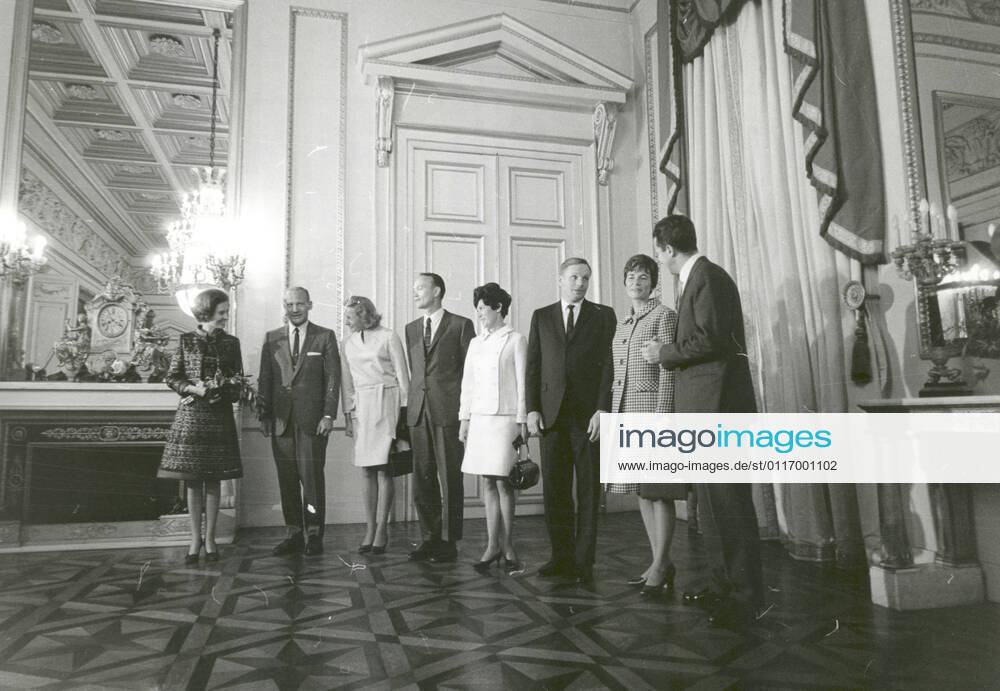 Brussels, Belgium - (FILE) -- The King of Belgium, Baudouin I, and his Queen, Fabiola, pose along with the Apollo 11 astronauts and their wives in the reception hall of the Royal Palace in Brussels, Belgium on October 9, 1970..