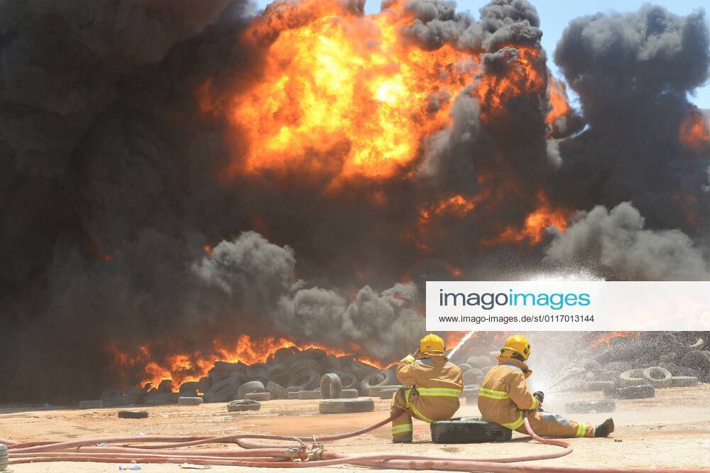 (210429) -- JAHRA GOVERNORATE, April 29, 2021 -- Firefighters try to control the blaze at a tire yard in Jahra Governorate, Kuwait, April 29, 2021. A fire broke out at the tire yard on Thursday, no casualties were reported. (Photo by Xinhua) KUWAIT-JAHRA GOVERNORATE-TIRE YARD-FIRE Asad