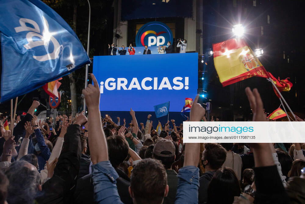 People s Party (PP) candidate Isabel Diaz Ayuso speaks outside the party headquarters next to other party members in Madrid while people celebrate after the Madrid regional elections. With more than 50 percent of the votes counted the candidate Isabel Diaz Ayuso is nearly to win the election for the presidency of the community of Madrid. Madrid Spain - ZUMAs197 20210504_zaa_s197_150