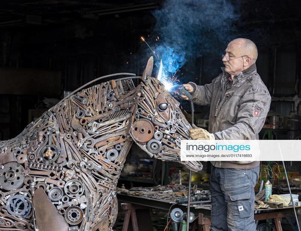 A horse made of steel Max Barske welds together his life-size steel horse in Schlemmin County Western Pomerania Ruegen The 60 year old sculptor uses thousands of tools, chains and machine parts For three months the sculpture of a cold-blooded horse, weighing about one ton, has been in the making After comp