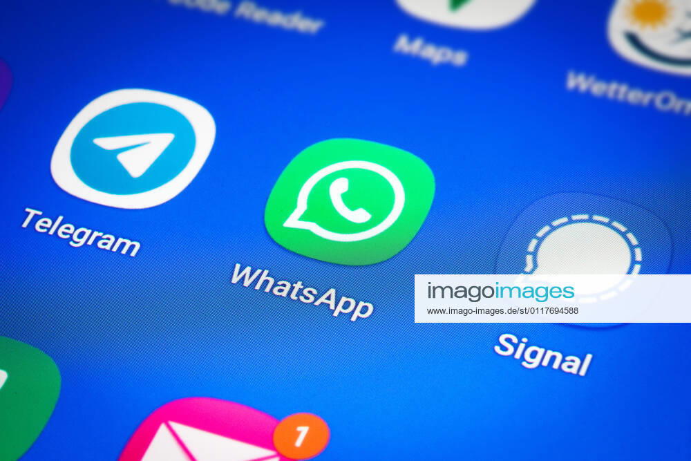 Logos of the social media messenger apps Telegram, WhatsApp and Signal on the screen of a smartphone