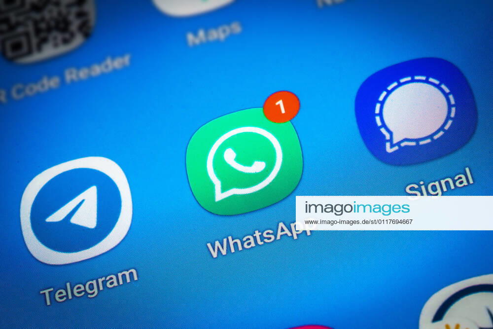 Logos of the social media messenger apps Telegram, WhatsApp and Signal on the screen of a smartphone
