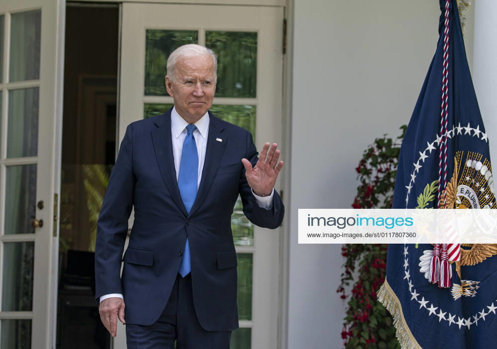 United States President Joe Biden enters the rose garden to give remarks on the new Covid-19 Centers for Disease Control mask guidelines in the Rose Garden, at the White House in Washington, DC on Thursday, May 13, 2021. Fully vaccinated people no longer need to wear a face mask or stay six feet away from others in most settings, whether outdoors or indoors, the Centers for Disease Control and Prevention said in updated public health guidance released Thursday Washington USA - ZUMAs152 20210513_zaa_s152_205