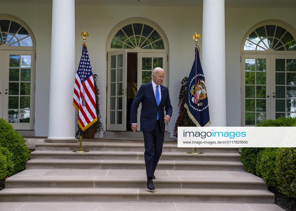 United States President Joe Biden enters the Rose Garden to give remarks on the new Covid-19 Centers for Disease Control mask guidelines in the Rose Garden, at the White House in Washington, DC on Thursday, May 13, 2021. Fully vaccinated people no longer need to wear a face mask or stay six feet away from others in most settings, whether outdoors or indoors, the Centers for Disease Control and Prevention said in updated public health guidance released Thursday.