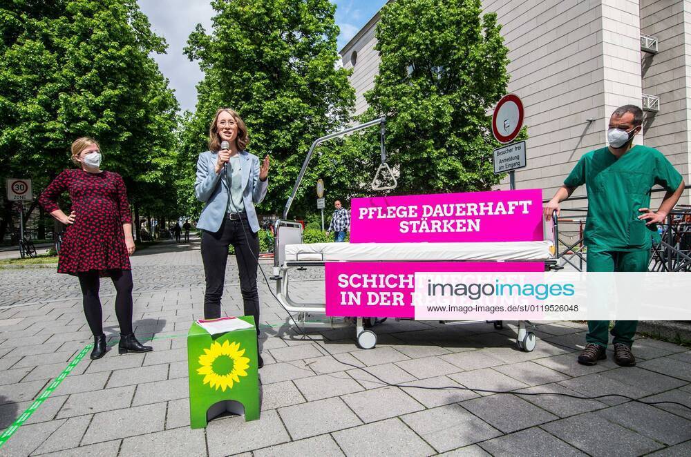 EVA LETTENBAUER, KATHARINA SCHULZE, and ANDREAS KAHL of the Bavarian Greens. The Bavarian Greens (die Gruenen Buendnis90) organized a protest action at the Bavarian Staatskanzlei (government building) in support of healthcare workers. During the Coronavirus crisis, the working conditions for this sector have come into greater focus and The Greens are pushing for better politics for this sector where pay structures and working conditions are improved and there exists a pathway for communication between the workers and political structures. Munich Germany - ZUMAb160 20210528_zbp_b160_041