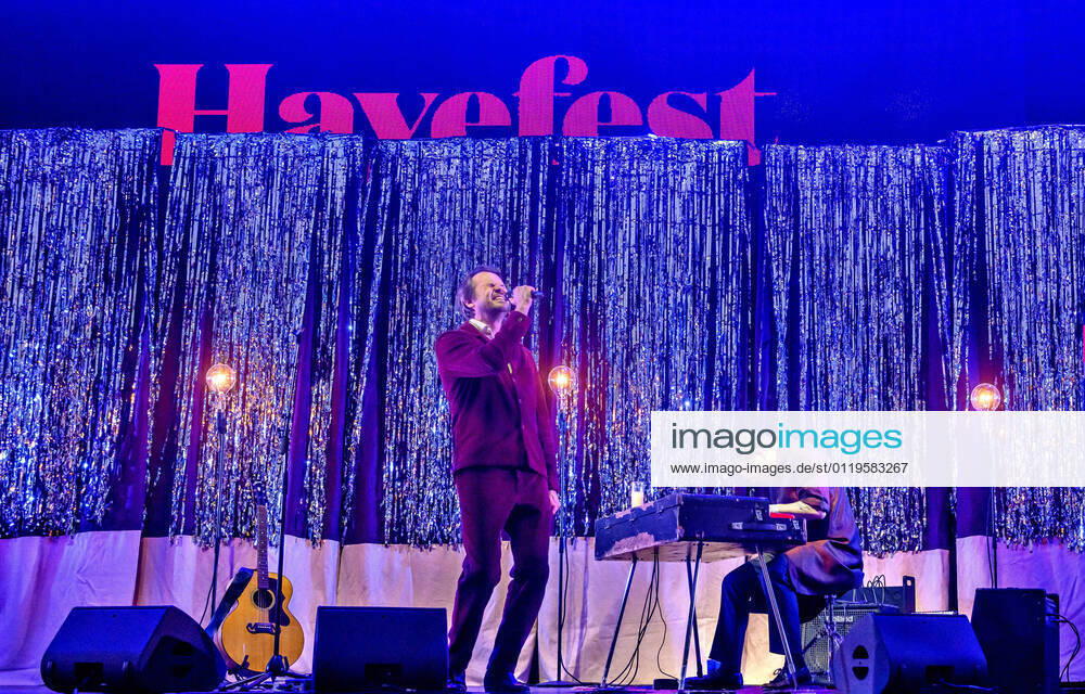 Danish Peter Sommer plays up to Havefest paa Plaenen in Tivoli on Friday 28 May 2021 with seated audience divided into two sections Havefest replaces Fredagsrock, which has been canceled due to the Covid 19 Corona crisis, Copenhagen