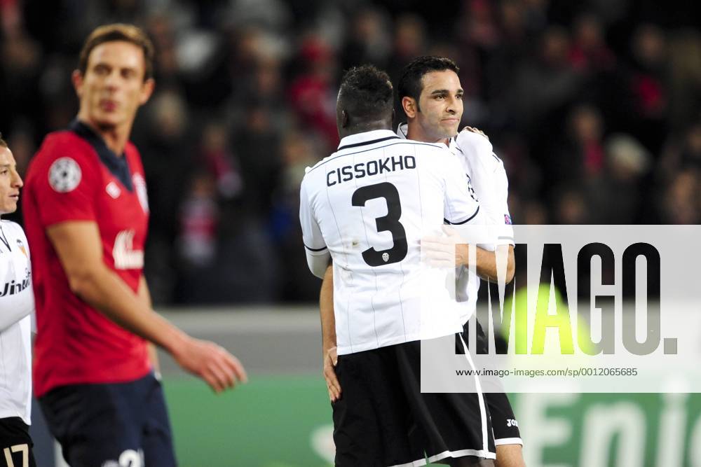 Adil Rami et Aly Cissokho (Fc Valence) en fin de Match FOOTBALL : Lille vs Fc Valence - Ligue des Champions - 05 12 2012 JBAutissier Panoramic