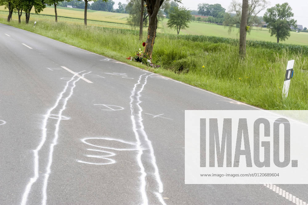 Accident traces and memorial for a traffic victim at the roadside car car accident fatal traffic accident traffic accident victim remembrance commemoration speed