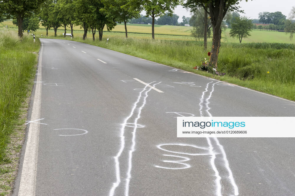 Accident traces and memorial for a traffic victim at the roadside car car accident fatal traffic accident traffic accident victim remembrance commemoration speed