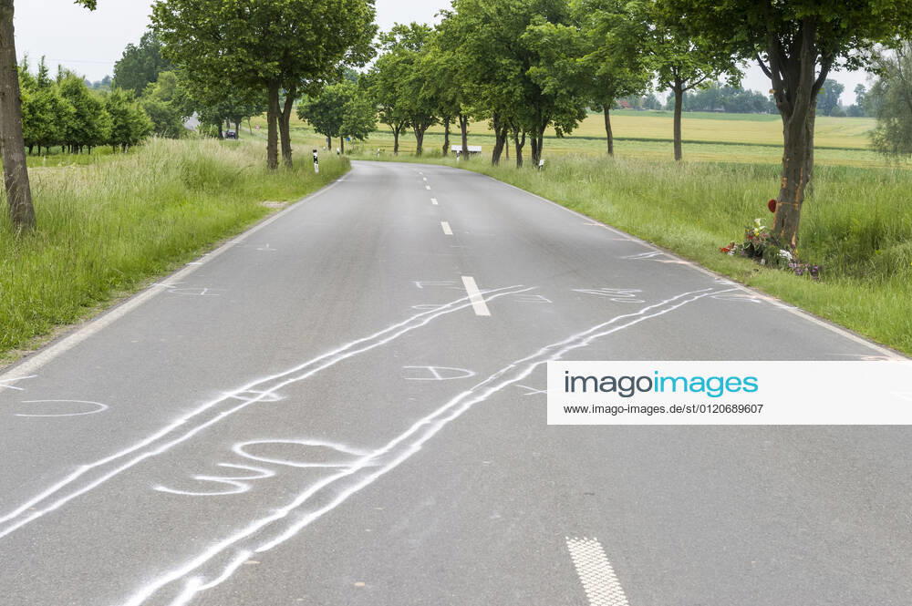 Accident traces and memorial for a traffic victim at the roadside car car accident fatal traffic accident traffic accident victim remembrance commemoration speed