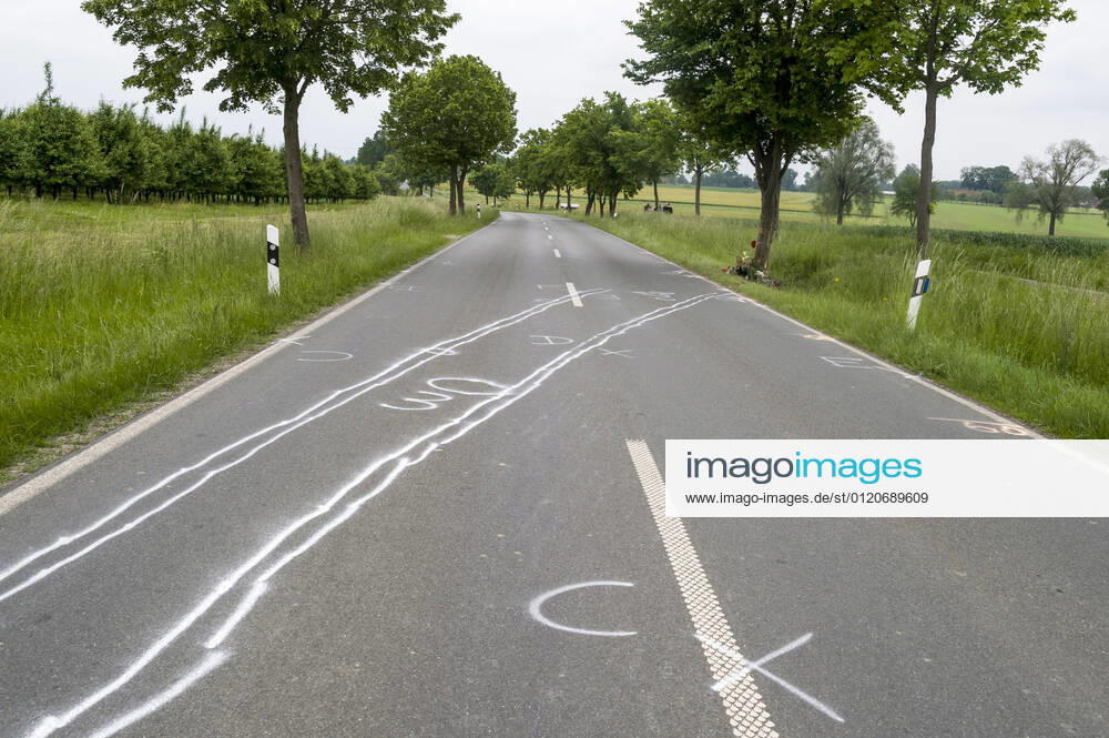 Accident traces and memorial for a traffic victim at the roadside car car accident fatal traffic accident traffic accident victim remembrance commemoration speed