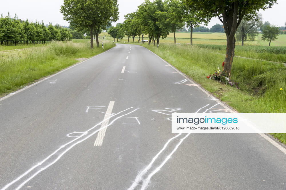 Accident traces and memorial for a traffic victim at the roadside car car accident fatal traffic accident traffic accident victim remembrance commemoration speed