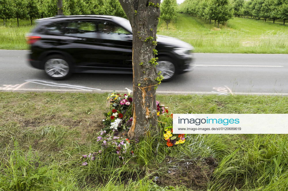 Accident traces and memorial for a traffic victim at the roadside car car accident fatal traffic accident traffic accident victim remembrance commemoration speed