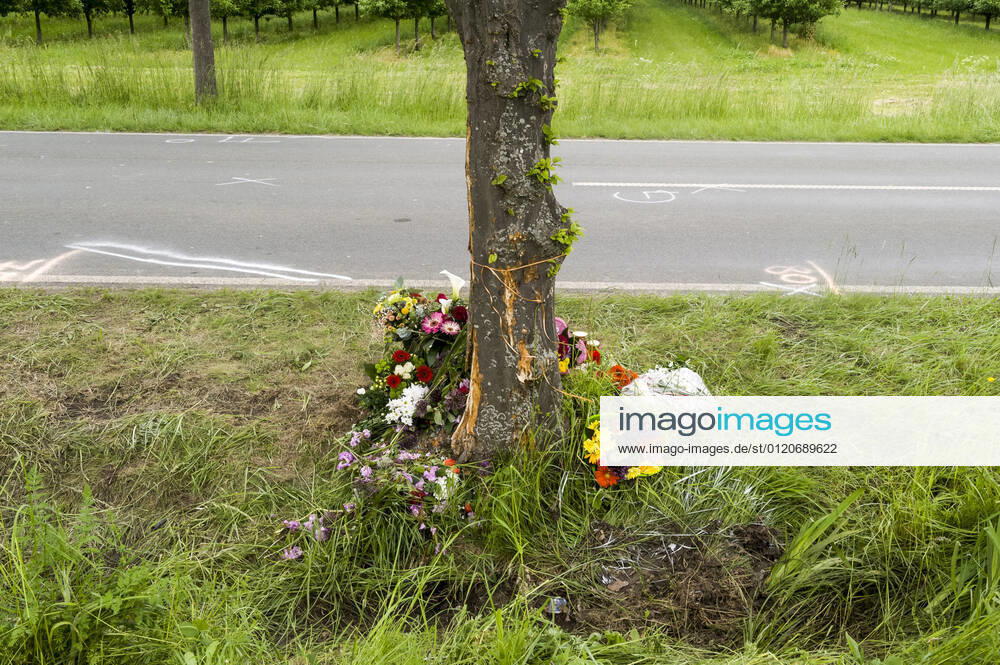 Accident traces and memorial for a traffic victim at the roadside car car accident fatal traffic accident traffic accident victim remembrance commemoration speed