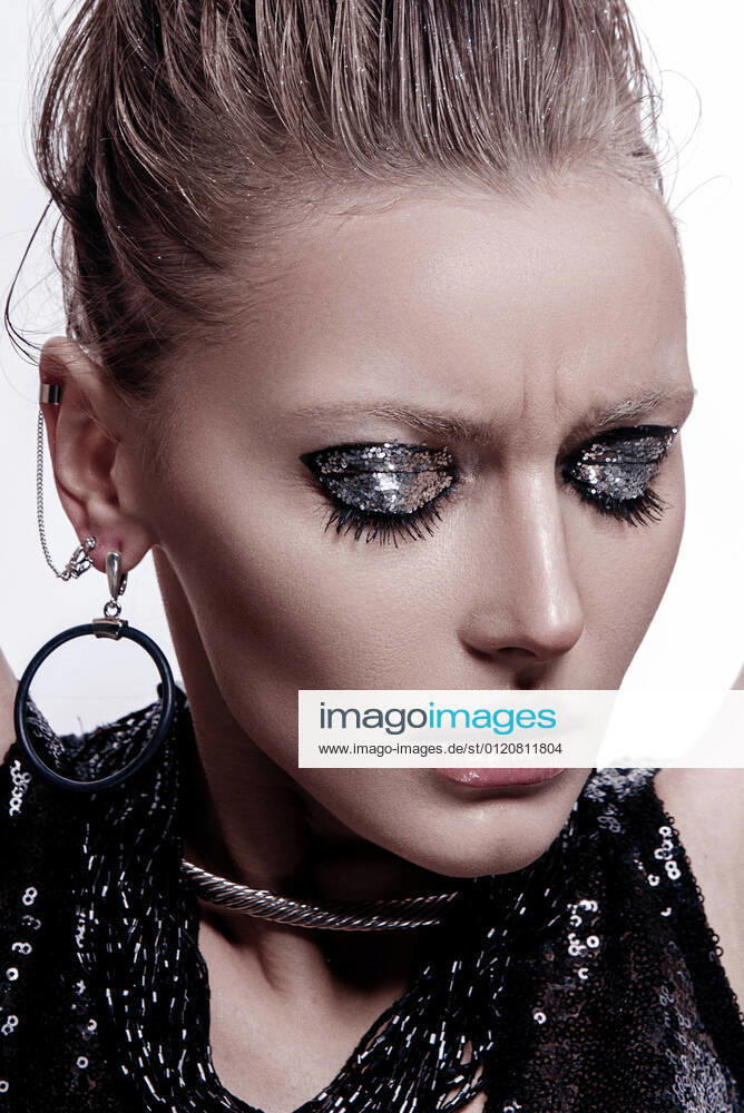Fashion style girl portrait. Beautiful fashion woman with professional styling, hairdress and makeup; dark glitter eyeshadows, rock style beauty portrait Belarus, Mogilev Region, Belarus CR_PJWUOI210608B-761205-01 ,model released, Symbolfoto