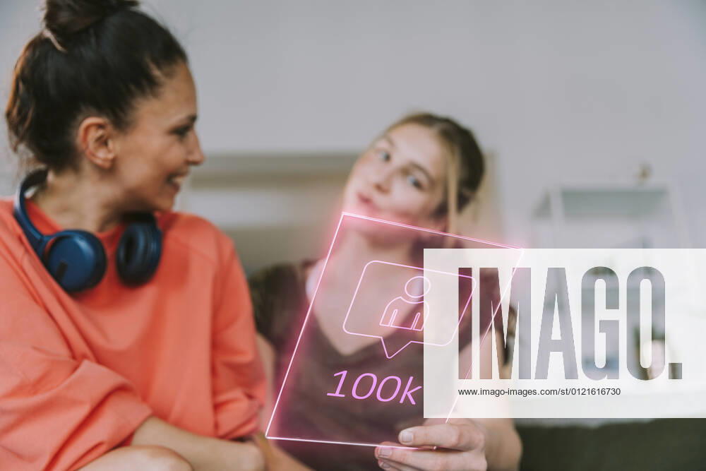 Female influencers discussing over 100k followers on social media at home model released Symbolfoto property released LIFIF00039
