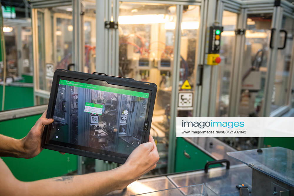 A part of a production plant of the Schneider Electric company is seen on June 17, 2021, in Pisek, Czech Republic. The multinational company manufactures electrical machines, devices and electronic equipment. Maintenance workers use an augmented reality (AR) when maintaining and repairing assembly machines. (CTKxPhoto PetrxSkrivanek) CTKPhotoP2021061804205 SKR_016