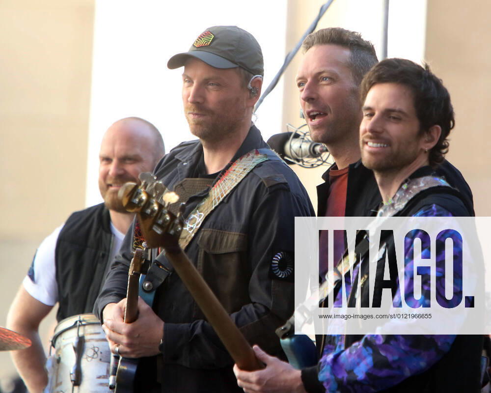 Jonny Buckland, Chris Martin, Will Champion Guy Berryman of Coldplay on Today Show Concert Series at Rockfeller Plaza in New York June 17, 2021
