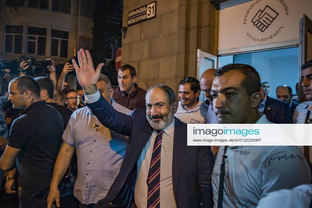 Nikol Pashinyan, Prime Minister of Armenia and main candidate of the Civil Contract party, salutes to his supporters in the entrance of his headquarters after winning the parliamentary elections in Armenia. Yerevan Armenia - ZUMAa131 20210621_zap_a131_002