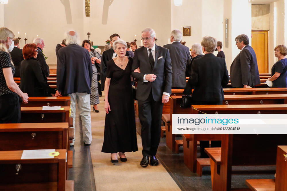 Susanne Pillau, Hans Juergen Schatz leaving the church after the funeral service for Horst Pillau in the Ev Kirche zum Heilsbronnen, Berlin