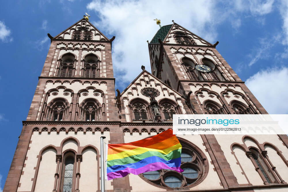 A rainbow flag flies at the Herz Jesu church in Freiburg, Germany