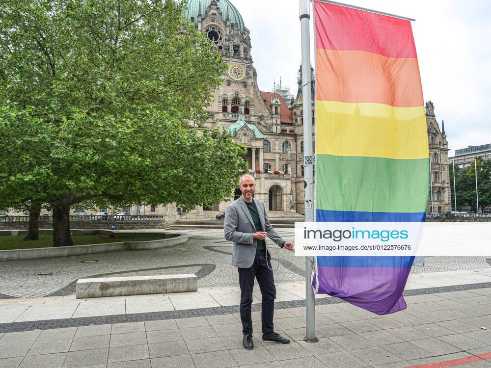 Hanover shows rainbow flag Hanovers mayor Belit Onay himself raises the last of the eight rainbow flags in front of the New Town Hall.