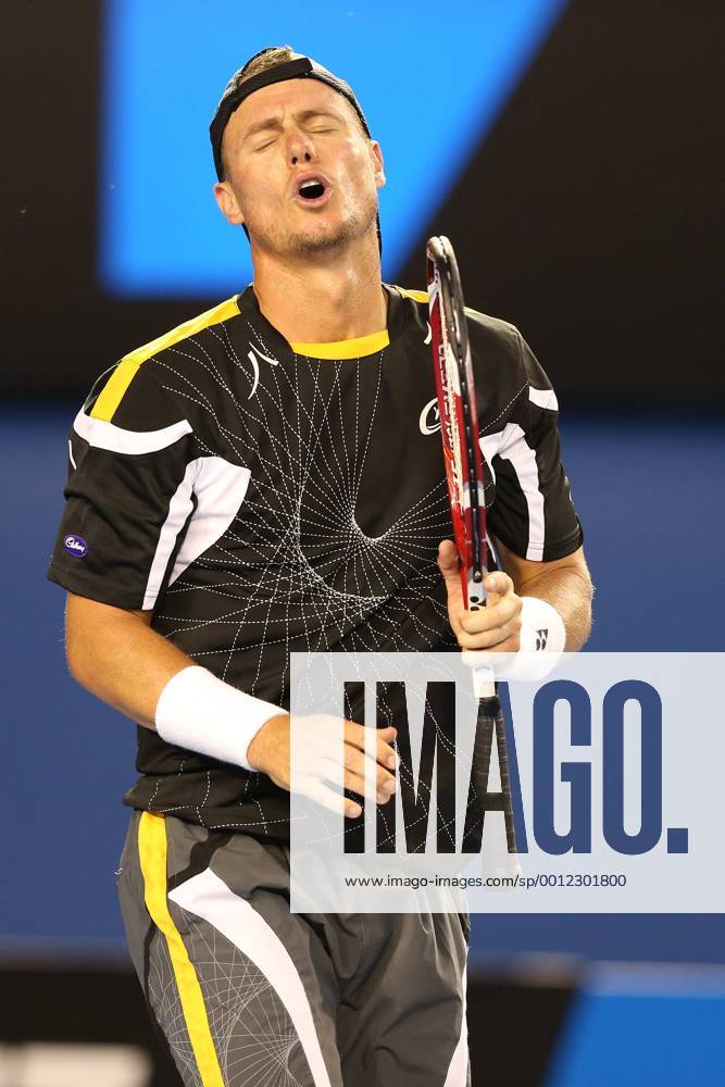 Lleyton Hewitt ( AUS ) reacts after missing a shot during the first round of the Australian Open at Melbourne Park Tennis Centre in Melbourne, Australia. TENNIS: JAN 14 Australian Open Icon130114446
