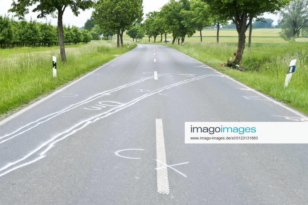 Accident traces and memorial for a traffic victim at the roadside car car accident fatal traffic accident traffic accident victim remembrance commemoration speed
