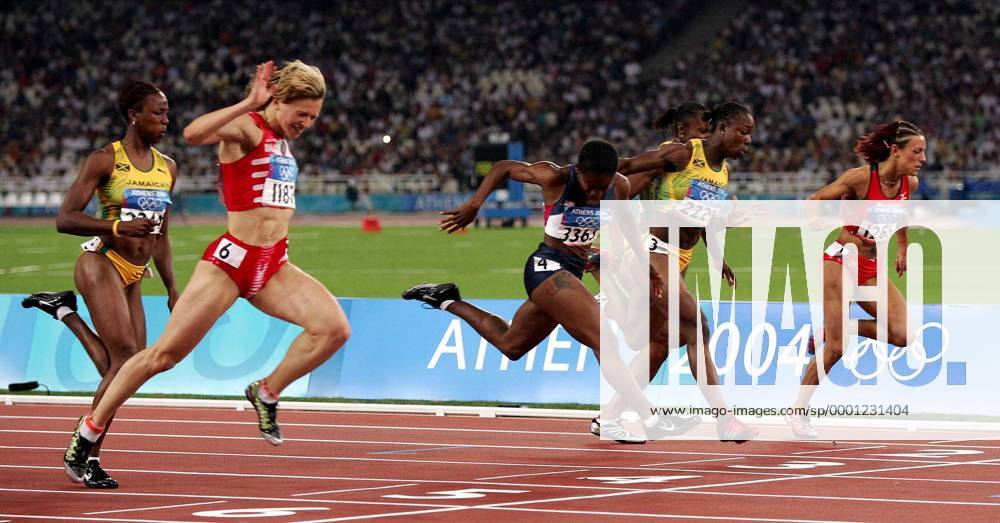 Yuliya Nesterenko (Weißrußland, 2. v. li.) wird Olympiasiegerin über die 100 Meter, daneben v. re.: Ivet Lalova (Bulgarien), Veronica Campbell (Jamaica), Lauryn Williams (USA) und Sherone Simpson (Jamaica) Leichtathletik OS Sommer Damen Olympische Sommerspiele Athen 2004, Olympia, Olympiade, Spiele, Finale, Endlauf Gruppe Nationaltrikot, Maroussi Dynamik, Kampf,